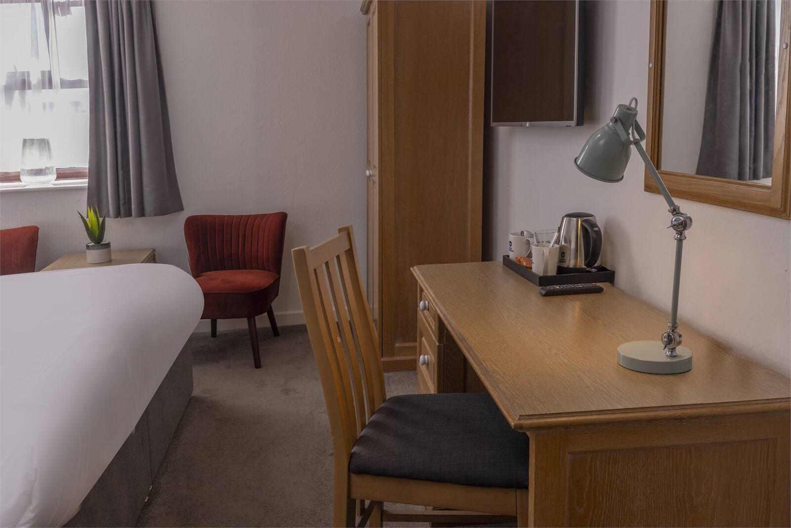 A bedroom at Hotel Rembrandt